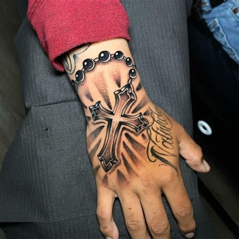 rosary tattoo design|praying hand with rosary tattoos.